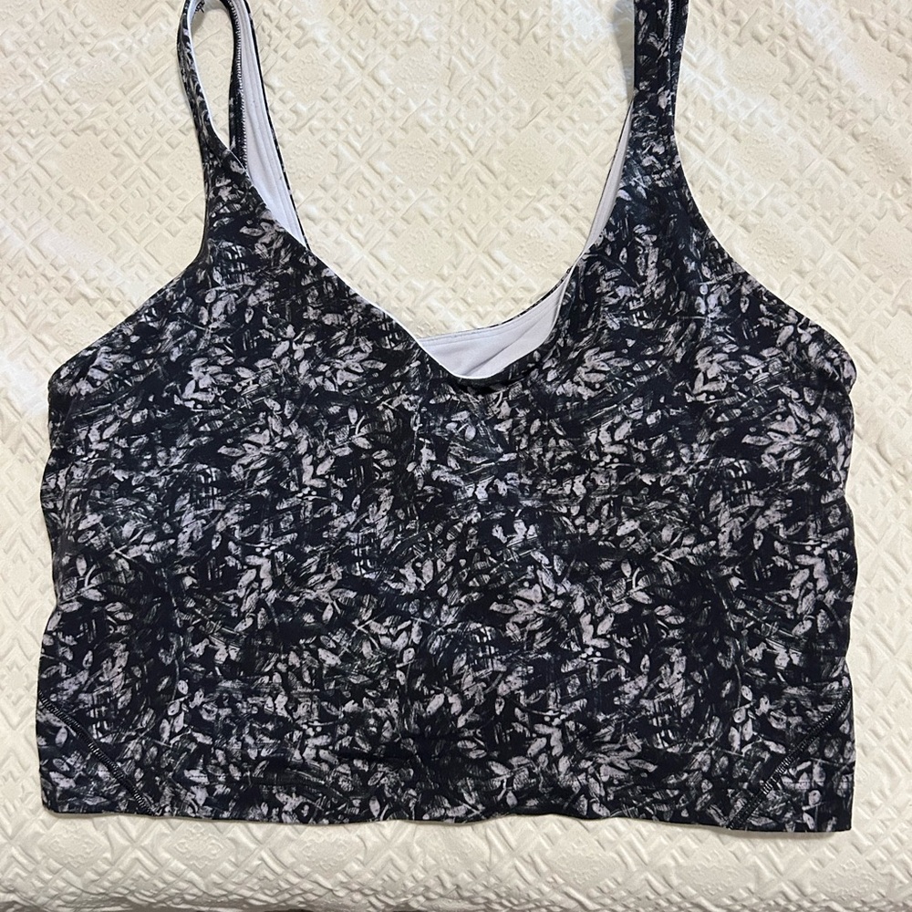 Lululemon aligned tank size 12. Black and white floral designed. Only worn once